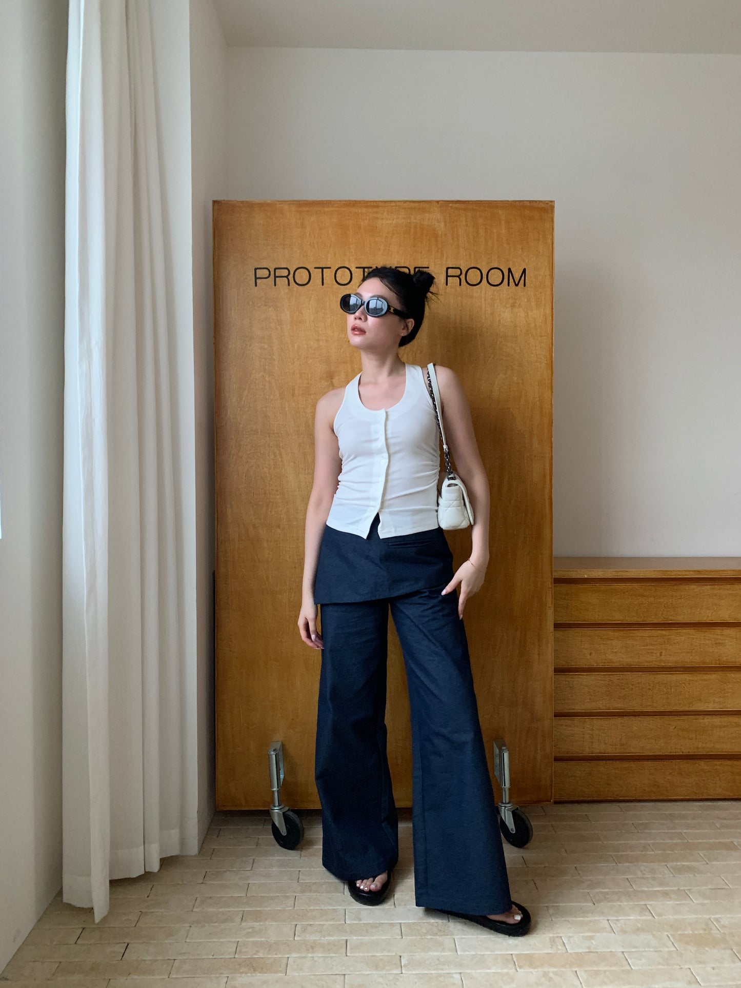 Less but better denim split-overlay trousers